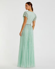 Green Sequined Wrap Over Ruffled Cap Sleeve Gown