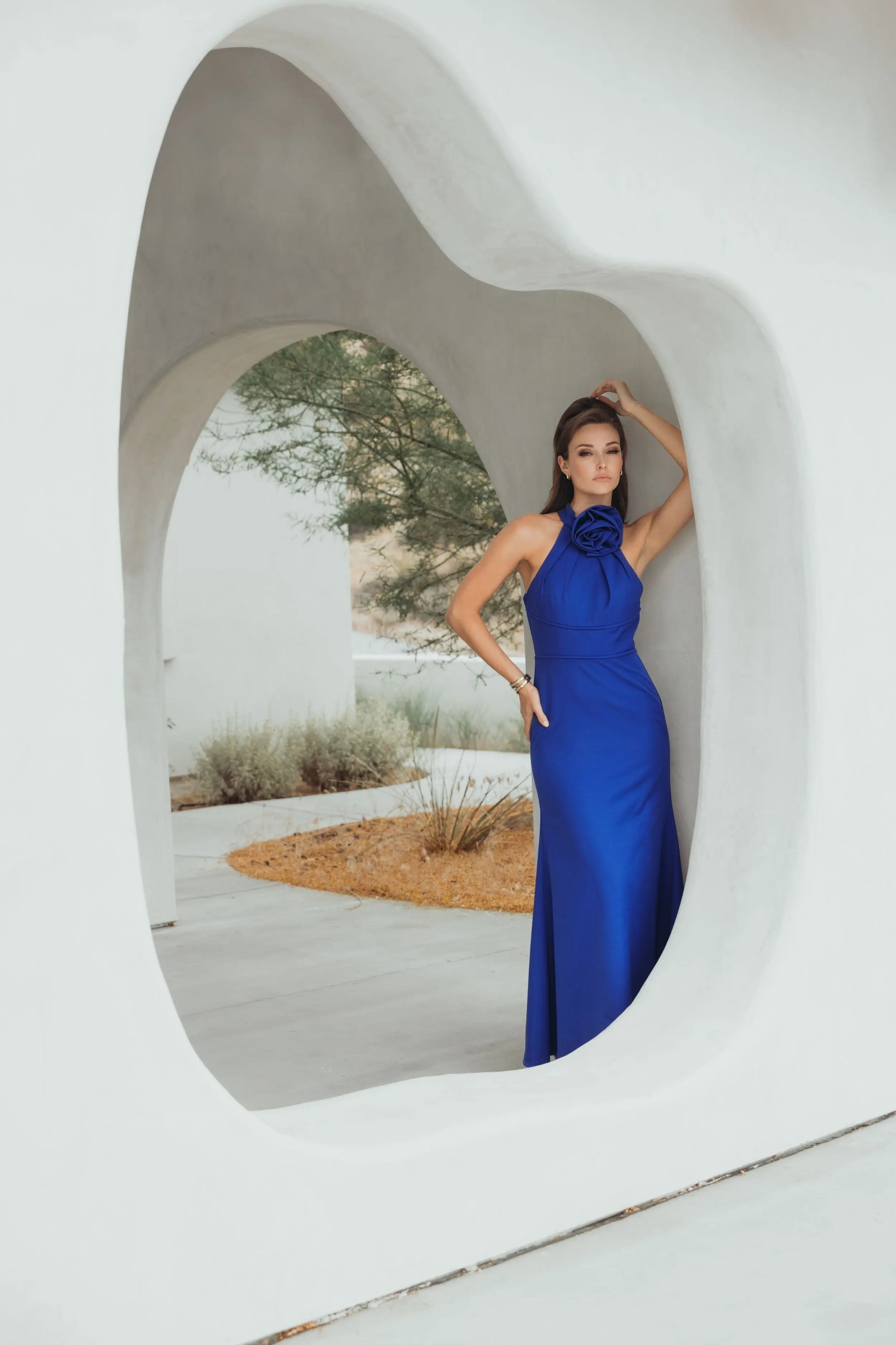 Blue Sleeveless Halter Neck Crepe Gown with Rosette Detail