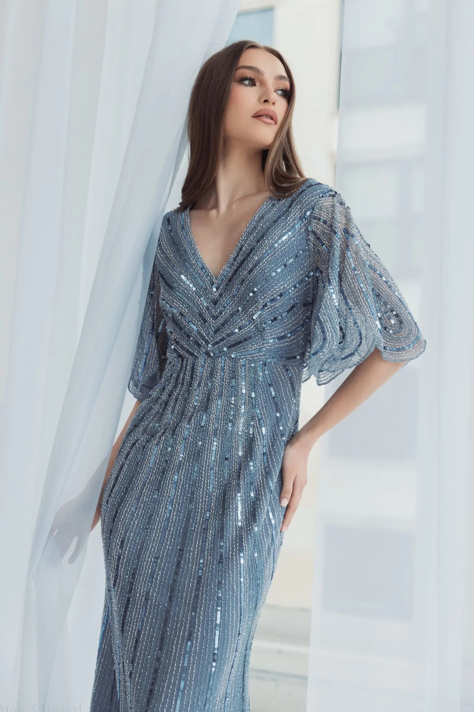 Blue Sequined V Neck Cape Sleeve Gown