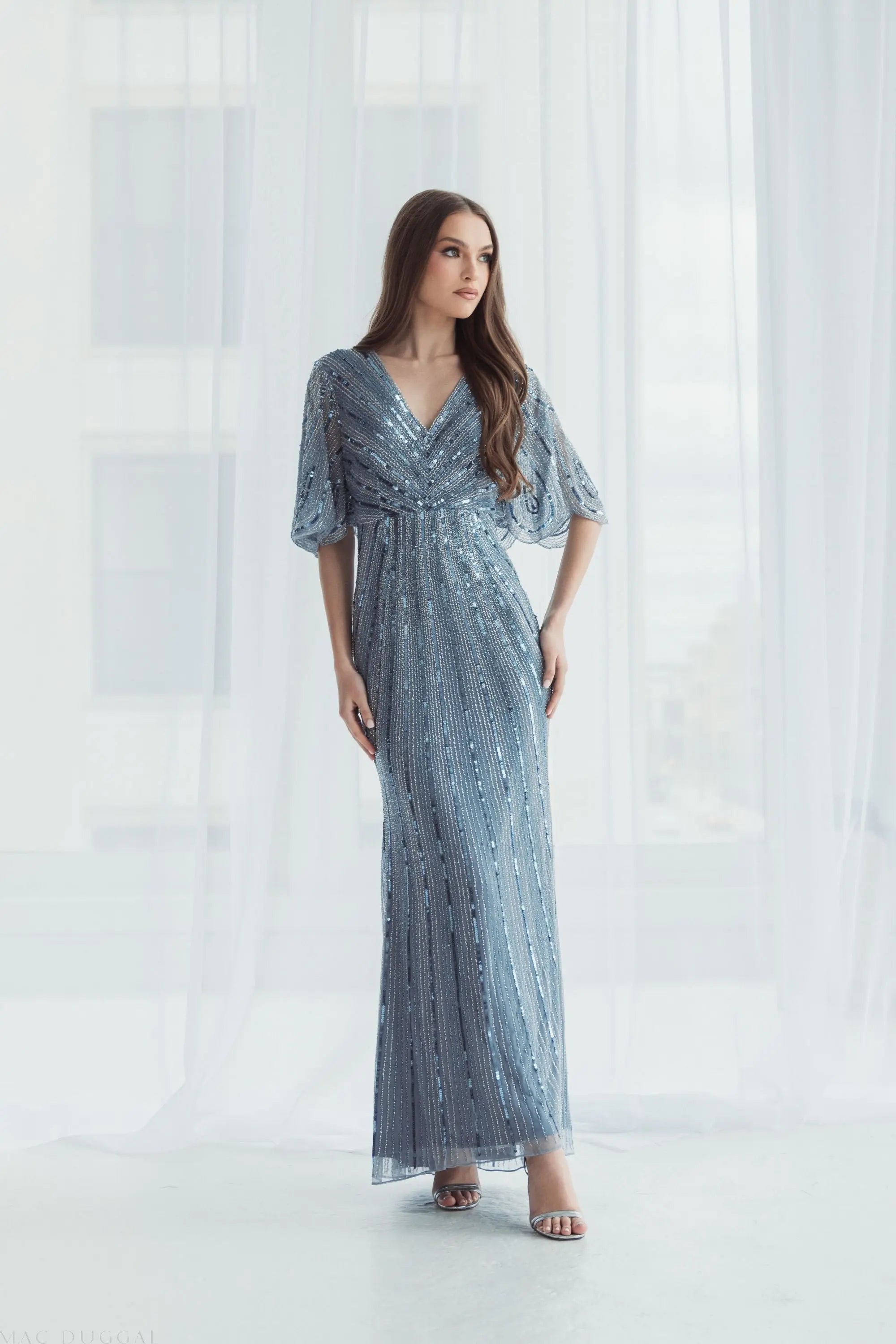 Blue Sequined V Neck Cape Sleeve Gown